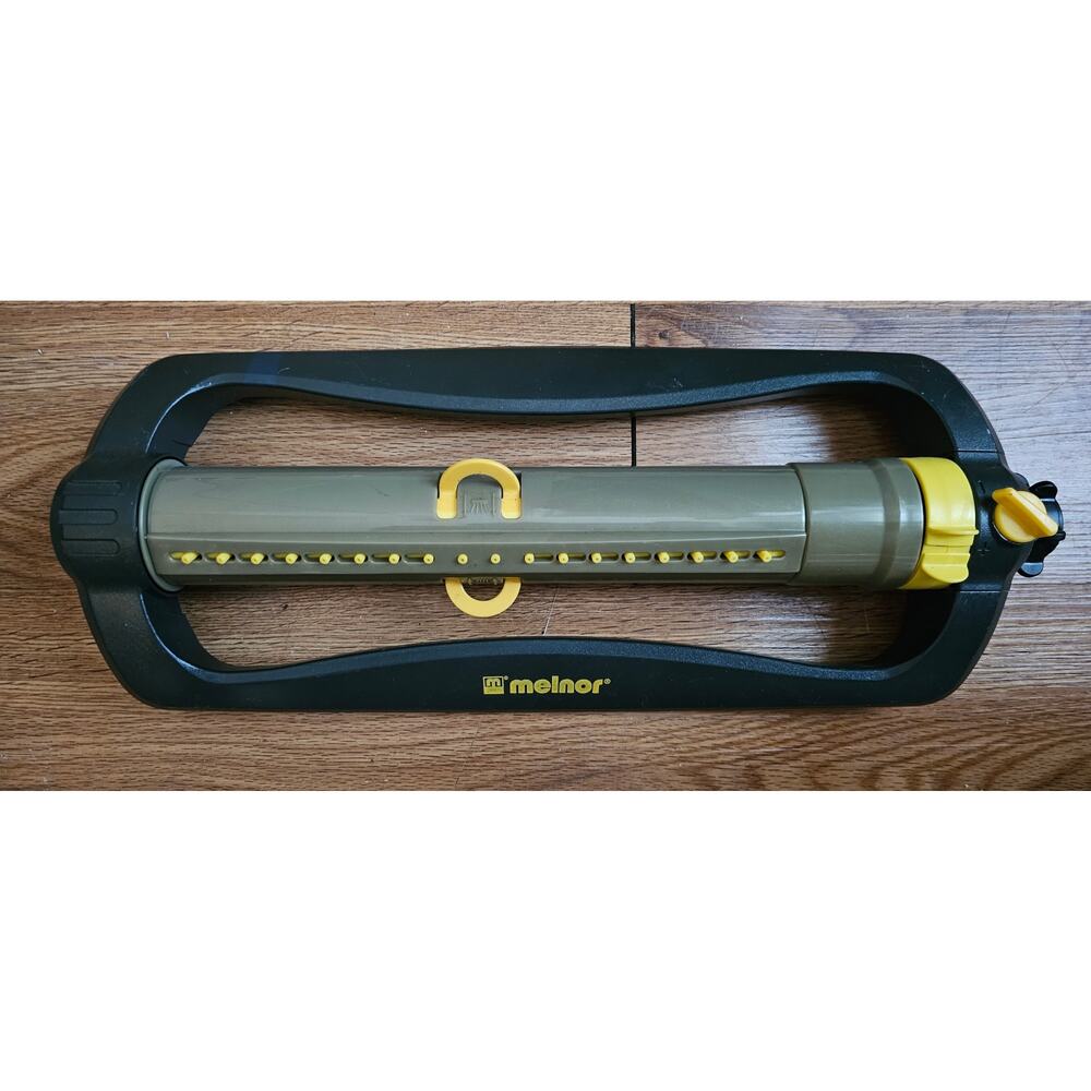 Melnor Oscillating Lawn Sprinkler 14J - Black/Green/Yellow - used